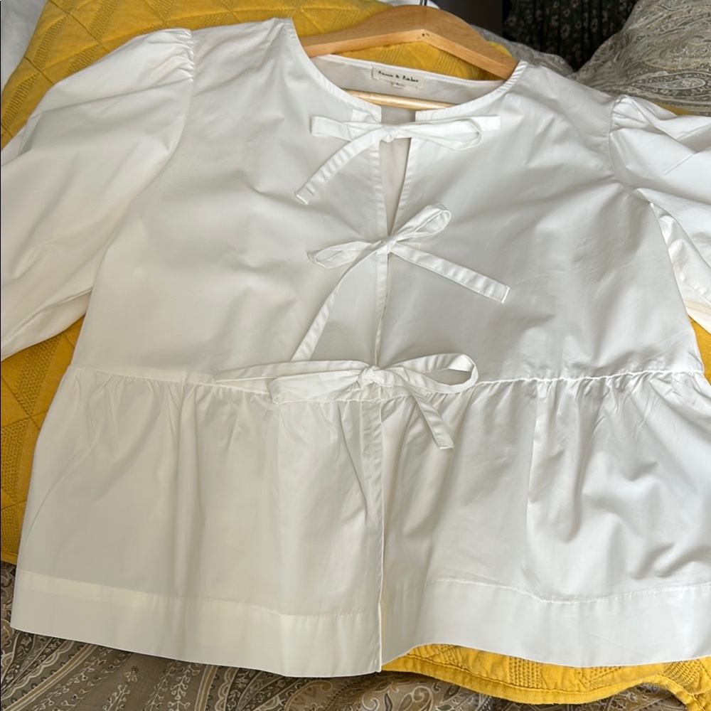 White Peplum Blouse with V-Cut Neckline